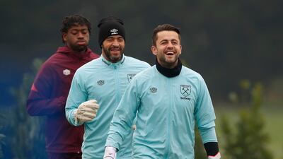 West Ham United gaolkeeper Lukasz Fabianski, front, with Darren Randolph. Reuters