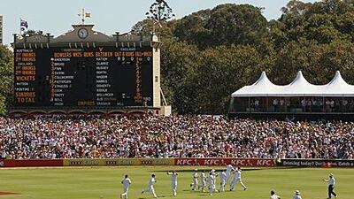 England celebrate the wicket of the Australian captain Ricky Ponting at the picturesque Adelaide Oval.