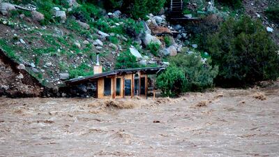 The fast-rushing Yellowstone River flooded what appeared to be a small boathouse in Gardiner, Montana. Sam Glotzbach / AP
