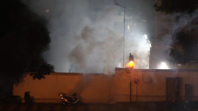 Tear gas smoke rises from the Russian embassy, fired by riot police, during clashes between riot police and Lebanese anti-government protesters, near the embassy in Beirut. AFP