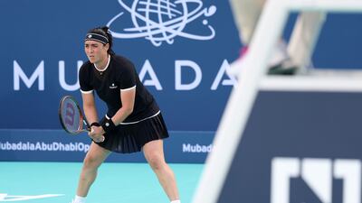 Ons Jabeur prepares to receive serve.