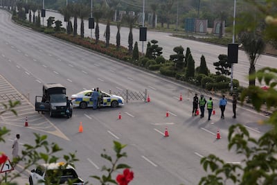 Pakistani security personnel block a road leading to the hotel in Islamabad where talks took place on April 11 to 12. Reuters