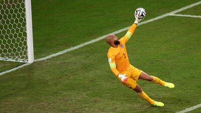 Tim Howard of the United States makes a save. Elsa / Getty Images