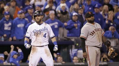 Kansas City’s Alex Gordon, left, hit a single and advanced to third in the ninth inning, but the tying run never came. David J Phillip / AP Photo