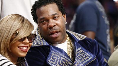 Rapper Busta Rhymes, right, watches the 63rd NBA All-Star Game. Paul Buck / EPA