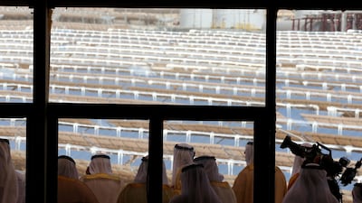 UAE officials observe Shams 1, the $600 million solar energy plant on the outskirts of Abu Dhabi. AFP