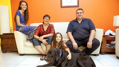 The Bruce family, who will be moving to Singapore, put funds from selling their books and DVDs towards a school trip to Tanzania. Antonie Robertson / The National