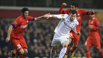 Tottenham's Gareth Bale looks for a way through the Inter Milan defence.