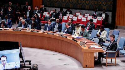 Sam Altman, right, chief executive and co-founder of OpenAI, watches as Dario Amodei, chief executive of Anthropic, delivers an online address at a UN Security Council meeting on September 23. Bloomberg