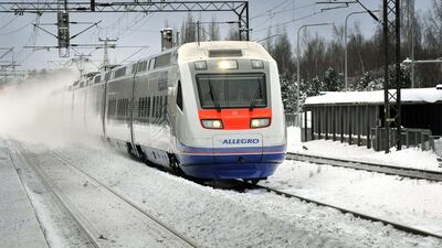 An Allegro train travels at a railway station in Helsinki. Timo Jaakonaho / Lehtikuva / Reuters