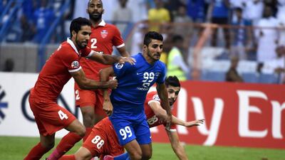 Ailton Almeida, centre, produced the equaliser for Al Hilal aginast Al Ahli in the Asian Champions League semi-final first leg Fayez Nureldine / AFP