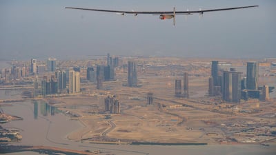 'Solar Impulse 2' during its first test flight in Abu Dhabi, on February 26, 2015, after being reassembled following delivery to the city.