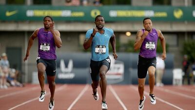 Justin Gatlin, centre, who has run the year’s fastest time in the 100-metre sprint, says the US team is ready for Beijing. Andy Lyons / AFP