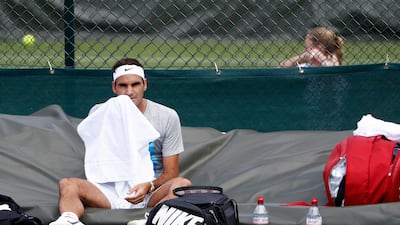 Roger Federer rests up ahead of his challenge for an eighth Wimbledon crown, which starts on Monday. Peter Klaunzer / AP