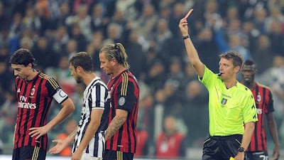 Defender Philippe Mexes was sent off on Sunday from Milan's 3-2 loss to Juventus. Di Marco / EPA