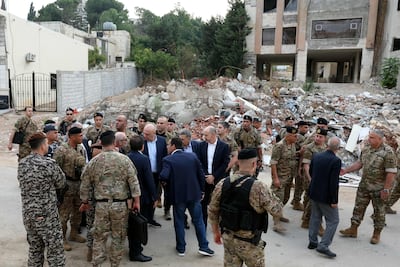 Lebanese President Joseph Aoun, centre, meets security officials during a visit to Nabatieh. AFP