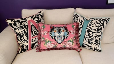 Cushions from The Odd Piece sport the initials of Nadine Kanso's two sons. Pawan Singh / The National