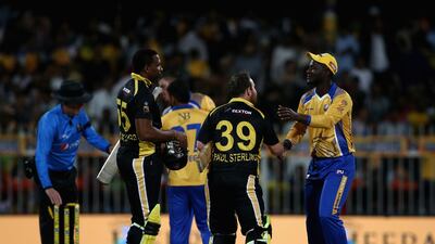 Players shake hands after the T10 League match between Bengal Tigers and Kerala Kings at Sharjah Cricket Stadium on December 14, 2017. Francois Nel/Getty Images