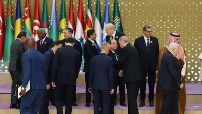Egyptian President Abdel Fattah El Sisi embraces Mr Erdogan. Getty Images