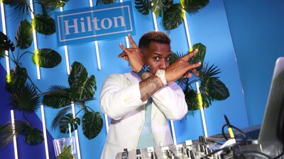 DJ Whoo Kid spinning in the DJ booth during a Miami Grand Prix event hosted by Hilton and McLaren Racing. AP