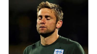 Goalkeeper Robert Green reacts after conceding a goal against the US.