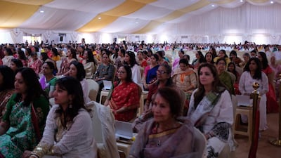 People attend the foundation stone laying ceremony.