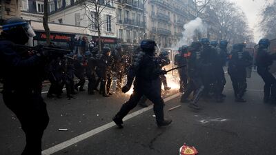 French riot police clash with protesters. Reuters