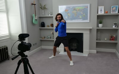 Joe Wicks, aka The Body Coach, teaches schoolchildren around the world physical education via live YouTube videos. Getty Images