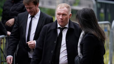 Paul Scholes, centre, in Manchester. AP