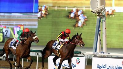 Dubai, United Arab Emirates-March,26, 2016: ( R No:14 ) Jockey Ryan Moore riding Real Steel wins the Race7 Dubai Turf sponsored by DP World during the Dubai World Cup at the Meydan Racecourse in Dubai. ( Satish Kumar / The National ) ID No: 53060Section: Sports