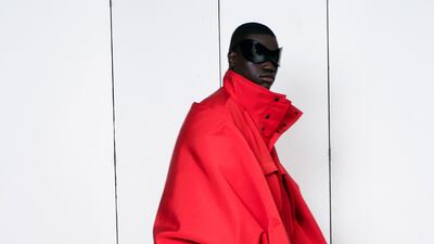 Balenciaga returned to haute couture in Paris this week with men's coats in satin with matching stoles.