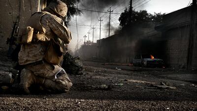 US Marines searching for weapons and improvised explosive devices, house by house, in Fallujah in November 2004. Franco Pagetti / VII