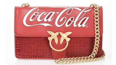Part of Pinko’s collaboration with Coca-Cola, this crystal-studded red handbag is a real conversation starter; Dh1,950. Courtesy of Pinko