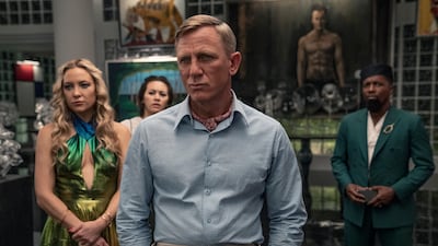 Daniel Craig, centre, stars as Benoit Blanc in the Knives Out mystery film series that is being adapted into a Netflix party game. Photo: Netflix