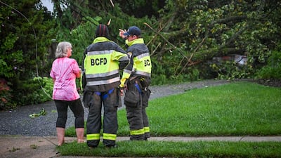 Assessing the damage caused by a storm in Maryland. The Baltimore Sun / AP