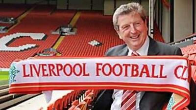 Roy Hodgson was the first choice after Benitez left and attends a photo session at the club.