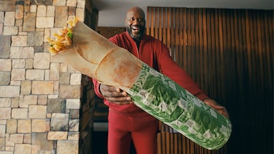 Shaquille O'Neal with the 'Shaqwarma' from Beit El Khetyar. Photo: DCT Abu Dhabi