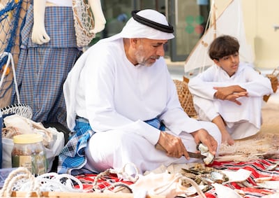 Saleh Al Hammadi, a skilled pearl-opener, shared his knowledge and passion for the Emirati tradition at Raha International School in Khalifa City. Photo: Raha International School Khalifa City