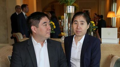 Grace, right, and Matthew Huang who were sentenced to three years in jail in Qatar in April 2014. The couple have appealed against a conviction over the death of their adopted daughter Gloria, who died of cachexia and dehydration. Karim Jaafar, Al Watan Doha/AFP Photo