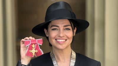 Es Devlin with her OBE for services to stage and set design at Buckingham Palace in May 2015. Getty Images