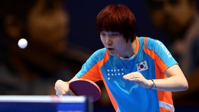 Lee Zion of Korea in action against Miu Hirano of Japan during Day 1 of the 2016 Table Tennis Asian Cup at Dubai World Trade Centre on April 28, 2016 in Dubai. (Photo by Warren Little/Getty Images)