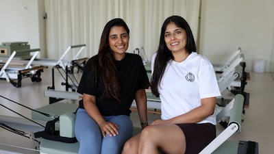 Sisters Chandini Guria, left, and Chanchal, founders of Ekaya Wellness Studio, say their business is their best investment, considering the time they put into it. Chris Whiteoak / The National