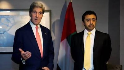 Foreign Minister Sheikh Abdullah bin Zayed meets with US Secretary of State John Kerry in London yesterday. Jason Reed / Reuters