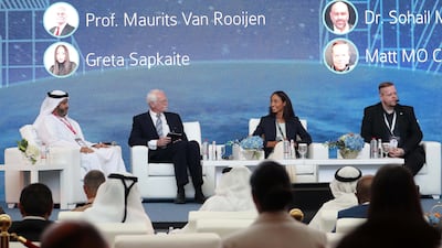 From left to right, Saeed Al Falasi, executive director of Future Design and Acceleration at Dubai Future Foundation; Maurits Van Rooijen, social and economic historian and academic administrator; Greta Sapkaite; and Matt Mo CVO, a business and growth coach, sit on a panel titled the ‘Role of Modern Technology in the Sustainable Future of Smart Cities’ on the first day of the Future Innovation Summit held at the Meydan Hotel in Dubai. All photos: Pawan Singh / The National