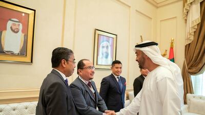 Sheikh Mohamed bin Zayed receives a delegate accompanying with Dato' Ali, Minister of Economic Affairs of Malaysia (not shown), during a Sea Palace barza. Mohamed Al Hammadi / Ministry of Presidential Affairs