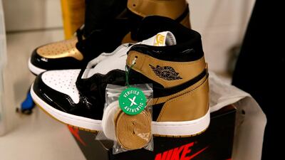 A pair of Air Jordan 1 Retro shoes are seen before being packed to ship out of Stock X in Detroit, Michigan. AFP