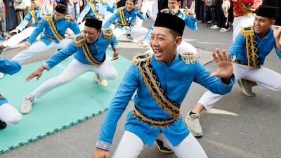 People take part in a procession as part of the Mawlid festival marking the birthday of the Prophet Mohammed, in Denpasar, Bali, Indonesia. EPA