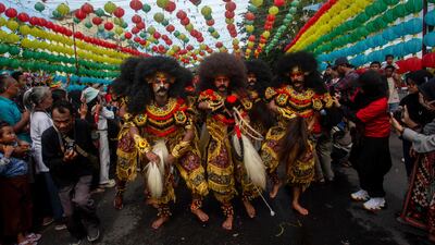 A street performance during the Grebeg Sudiro festival, part of Chinese New Year celebrations, in Solo, Central Java, Indonesia. AFP