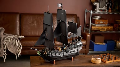 Captain Jack Sparrow’s Pirate Ship has a detachable rowing boat. Photo: Lego