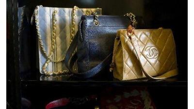 Classic bags from luxury brands such as Chanel fetch a premium in the UAE. Philip Cheung / The National